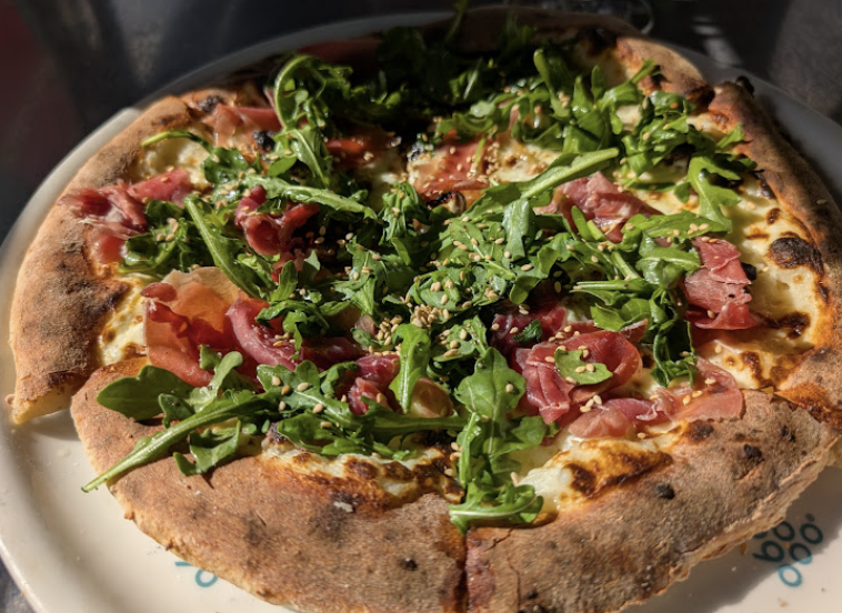 Sixty Vines signature dishes Fig & Prosciutto PizzaSpicy Sausage PizzaCreste di Gallo